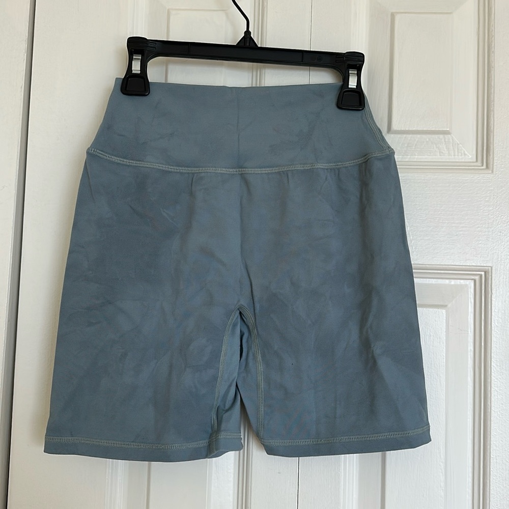 Alphalete small tie-dye blue high rise shorts.